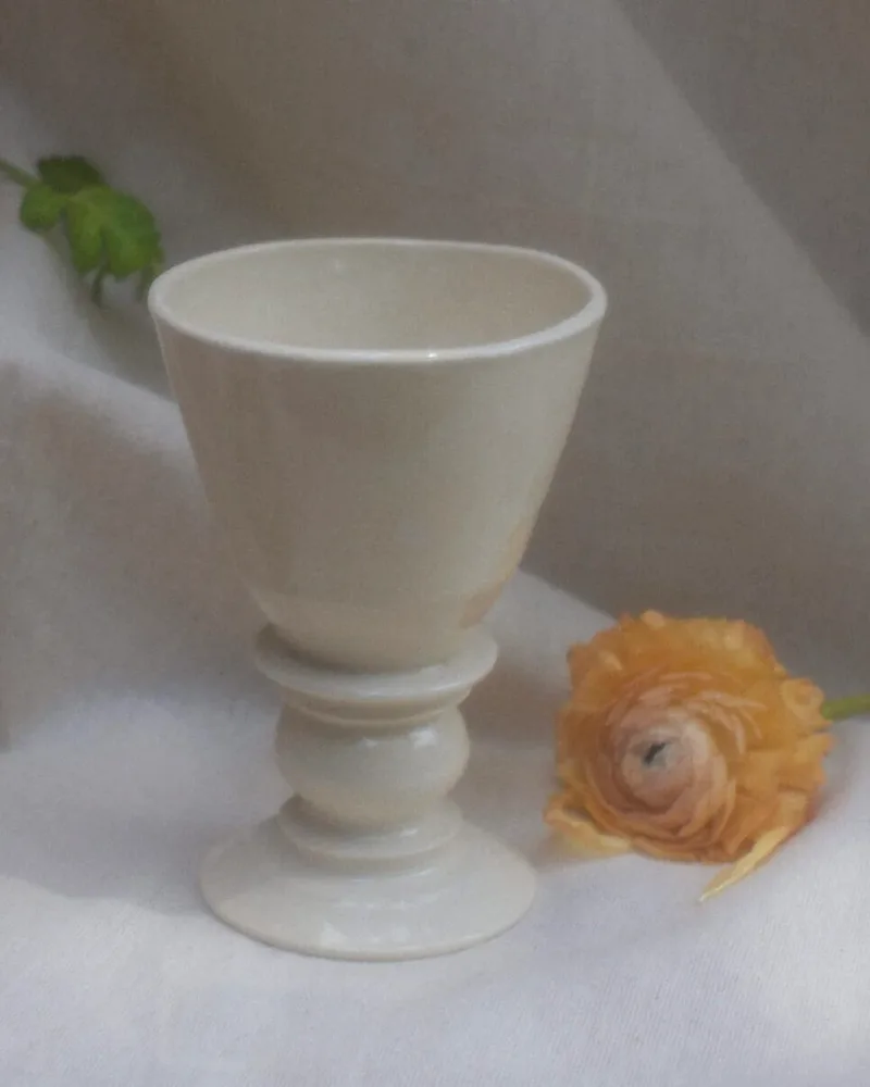 Rising goblet, cream stoneware with a peach ranunculus